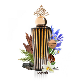 A perfume bottle surrounded by colorful flowers and other decorative items.